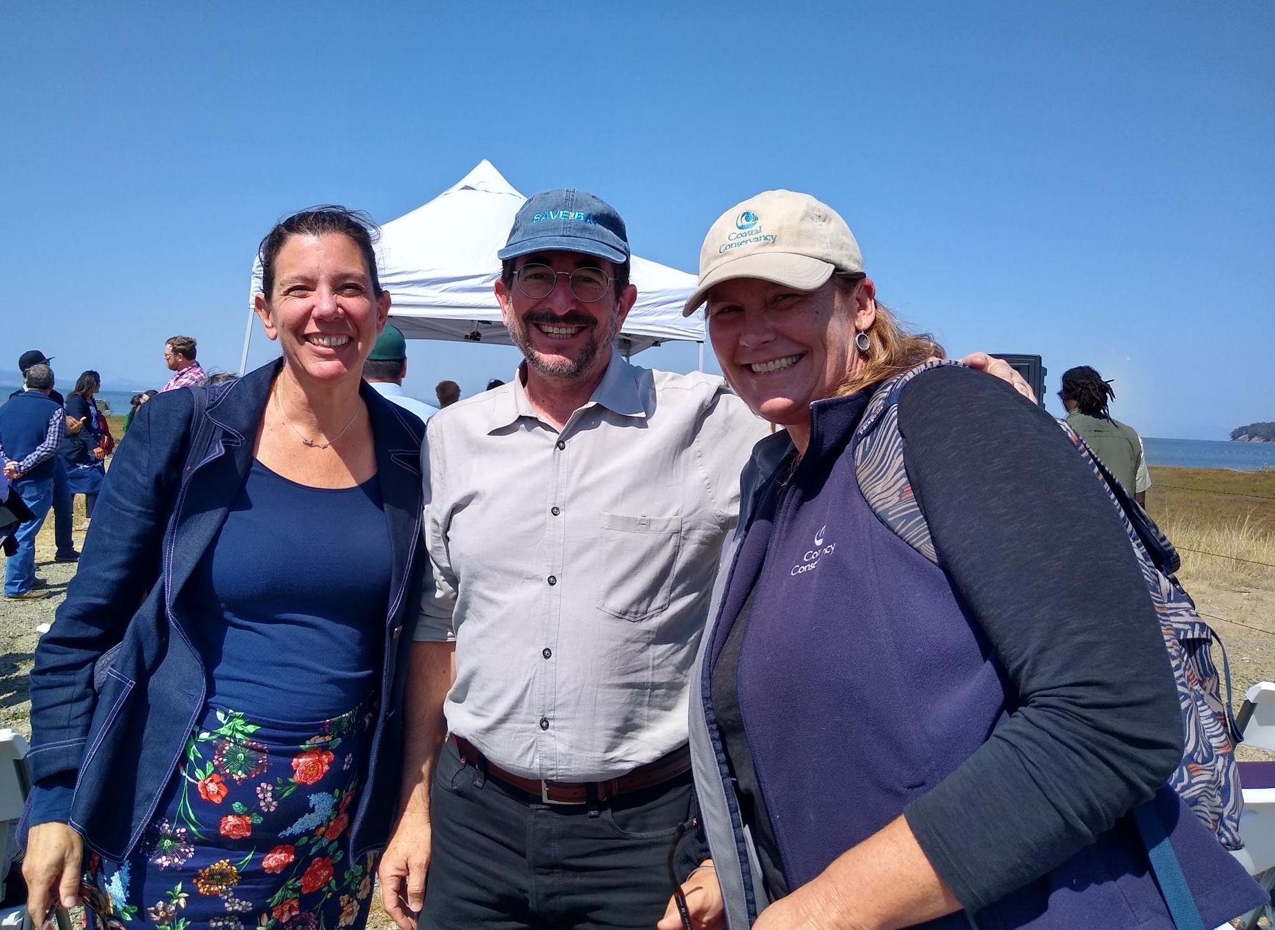 The Coastal Conservancy’s Amy Hutzel (left) and Marilyn Latta (right) with Save the Bay’s David Lewis