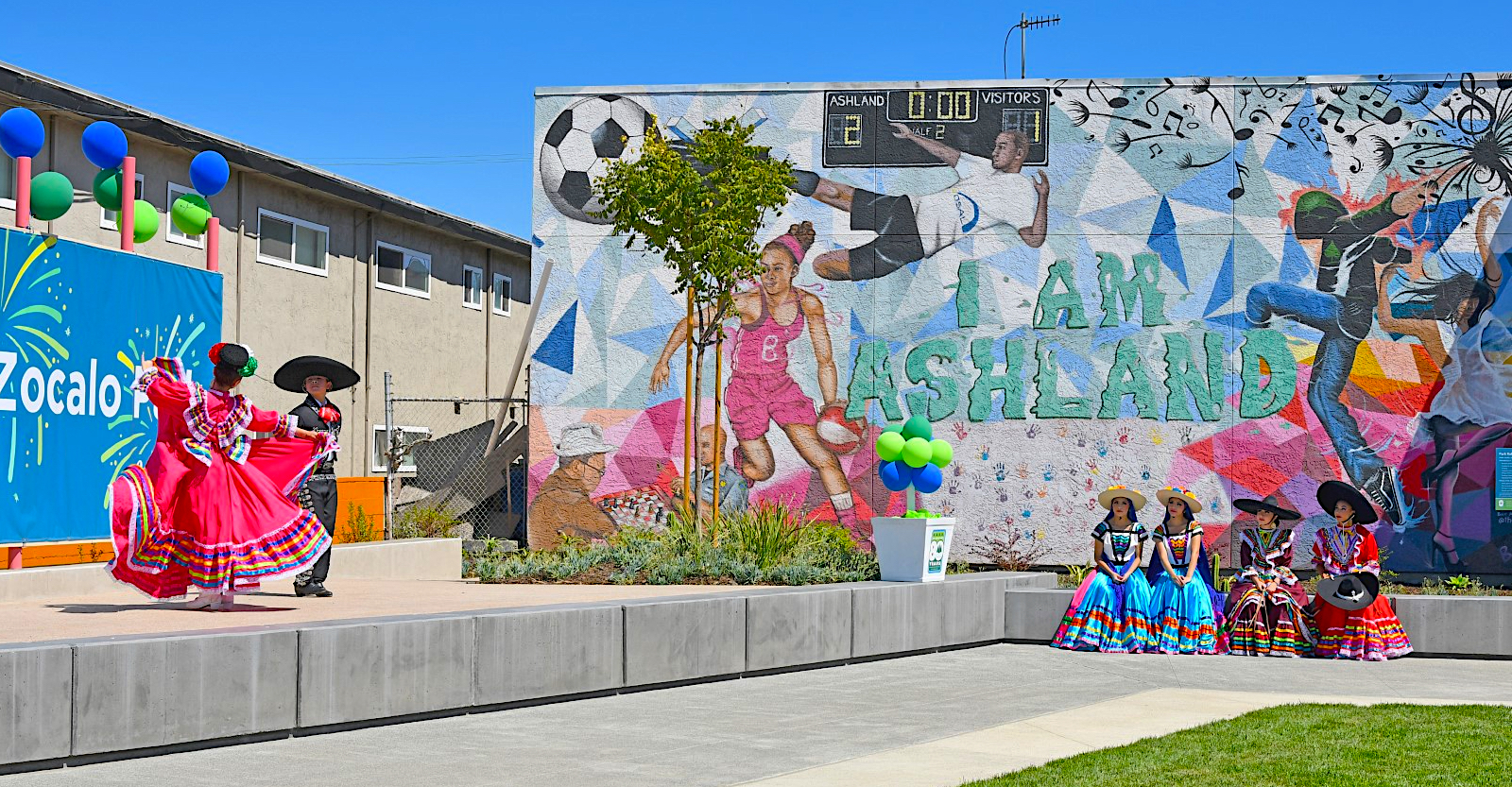 Opening day festivities with the existing Ashland town pride mural as backdrop.