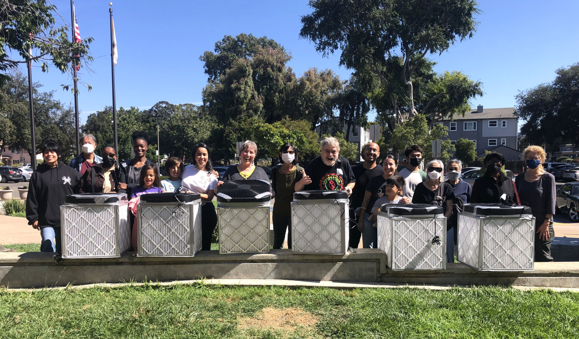 Attendees at a DIY air filter build, hosted by Prieto-Diaz, pose with their new filters. Photo: Cynthia Prieto-Diaz