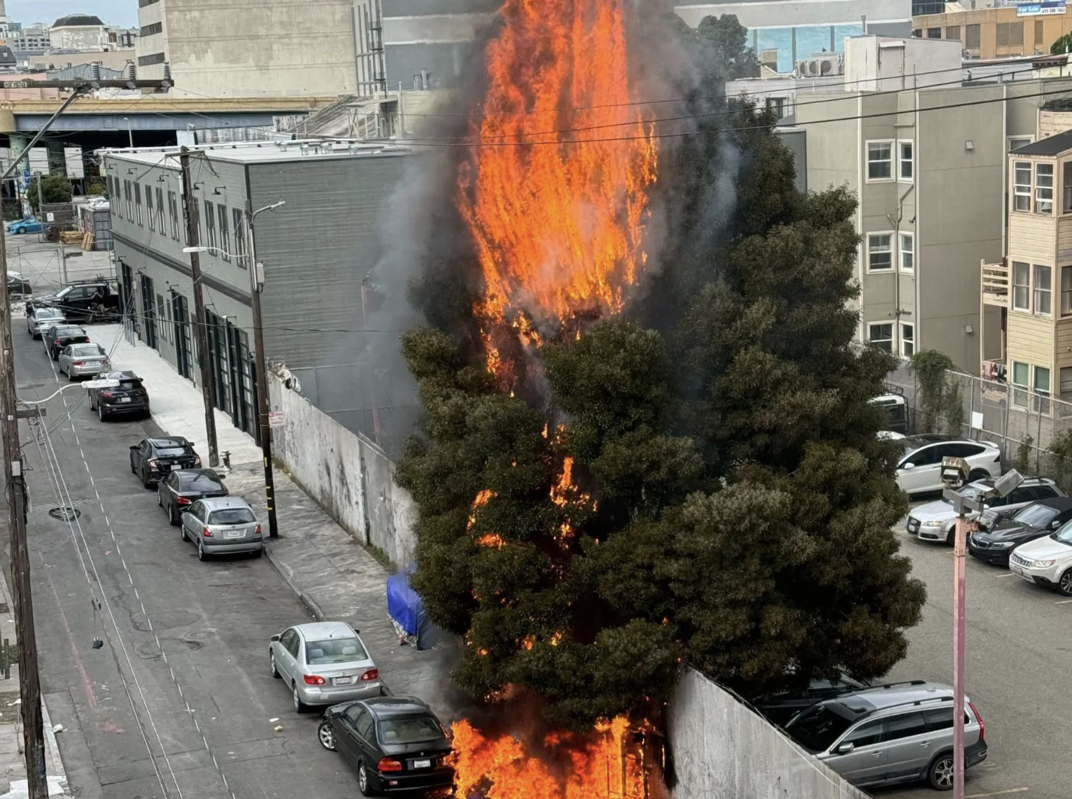 Fire from homeless encampment in the Mission District. Photo: Desiree Barrera for MissionLocal