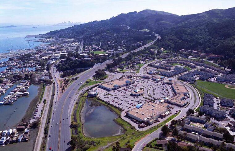 Marin City climbs the hill and surrounds Golden Gate Village and its parking lots on the west (right) side of Highway 101. Approaches often flood. 