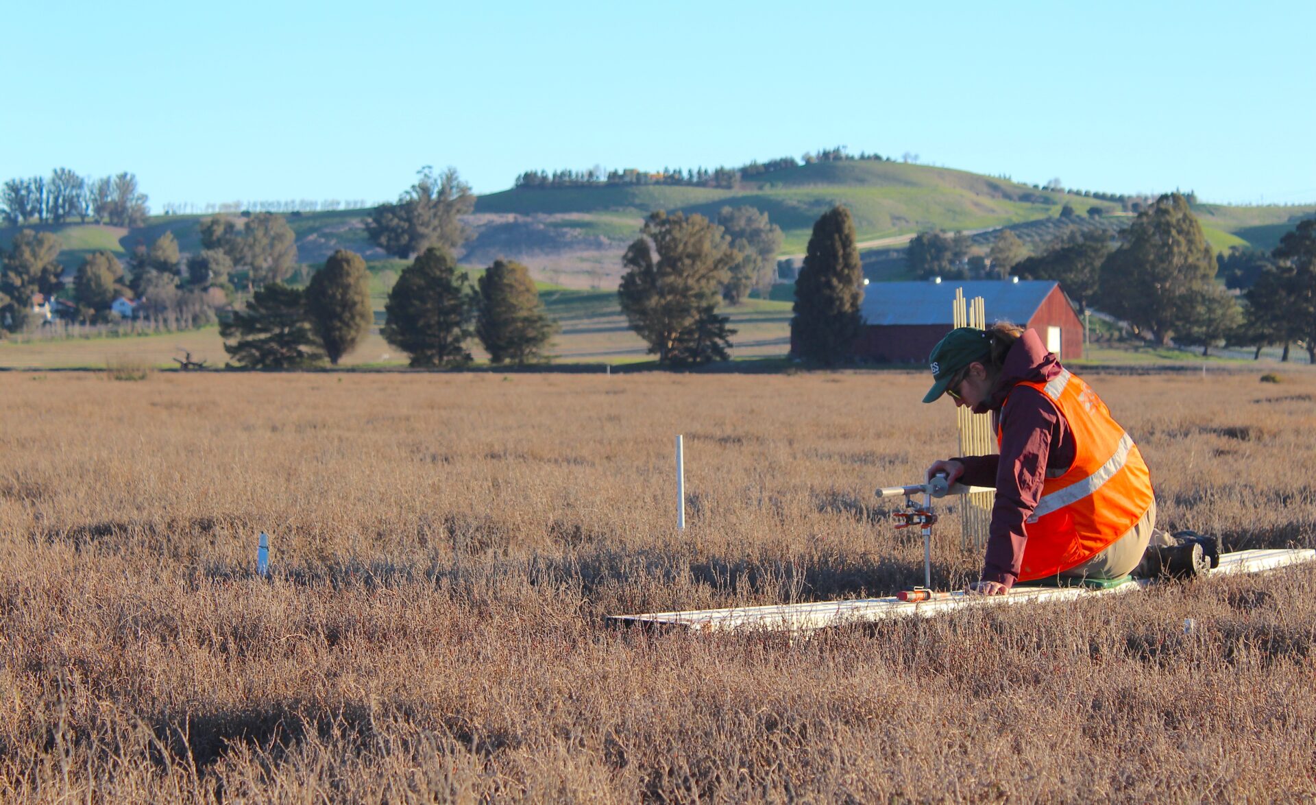 USGS scientist measures and profiles sediment behavior within Petaluma Marsh. Photo: USGS